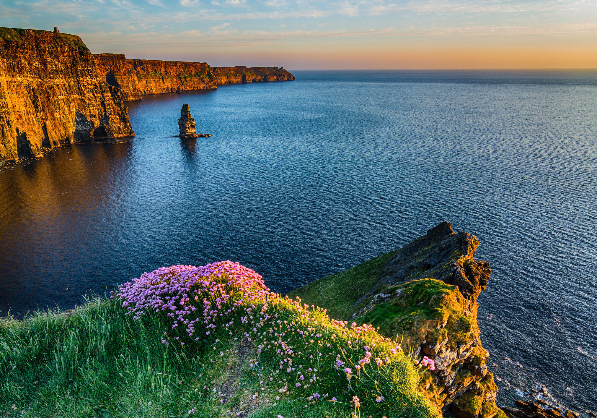 The Cliffs of Moher West coast of Ireland Ireland Irish world famous tourist attraction in County Clare. The Cliffs of Moher West coast of Ireland. Epic Irish Landscape and Seascape along the wild atlantic way. Beautiful scenic nature from Ireland.